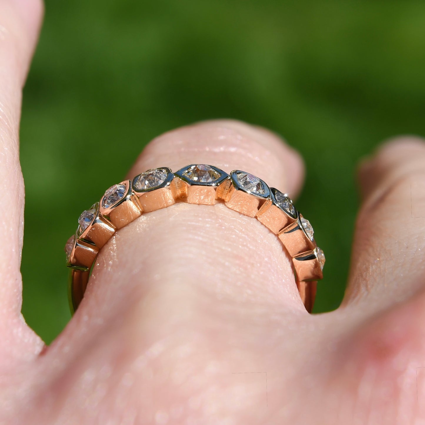 0.57 ct hexagonal, old mine and peruzzi cut diamond nine stone ring