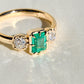 0.93 ct Colombian emerald and old mine cut diamond three stone ring