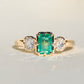 0.93 ct Colombian emerald and old mine cut diamond three stone ring
