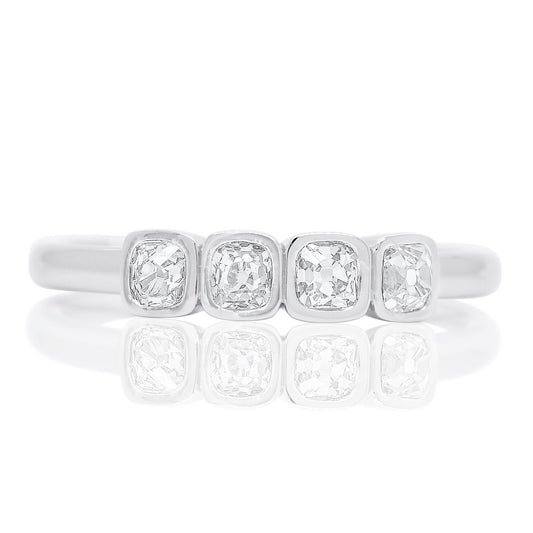 0.37 ct peruzzi cut diamond four stone band ring