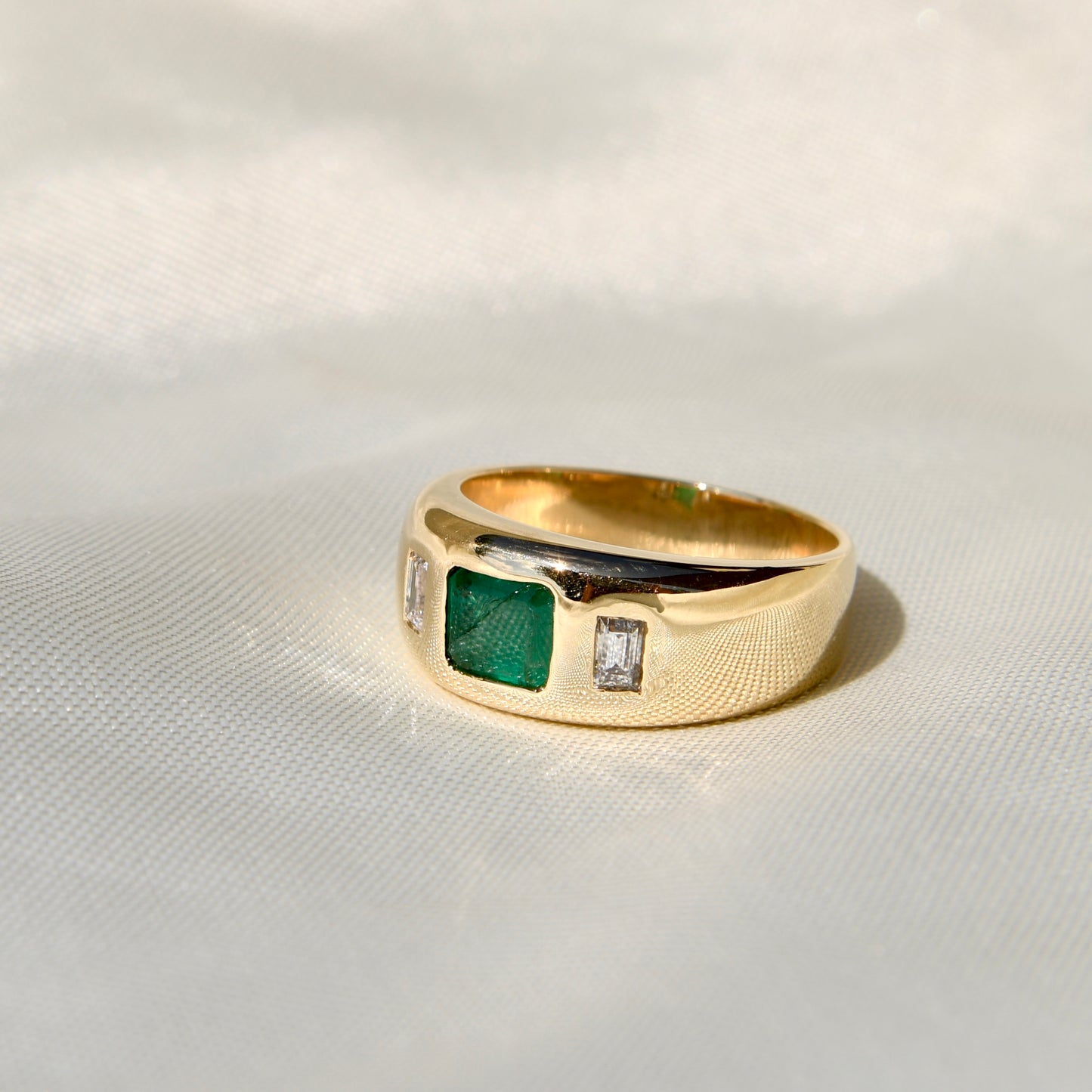 Vintage emerald and baguette cut diamond band ring