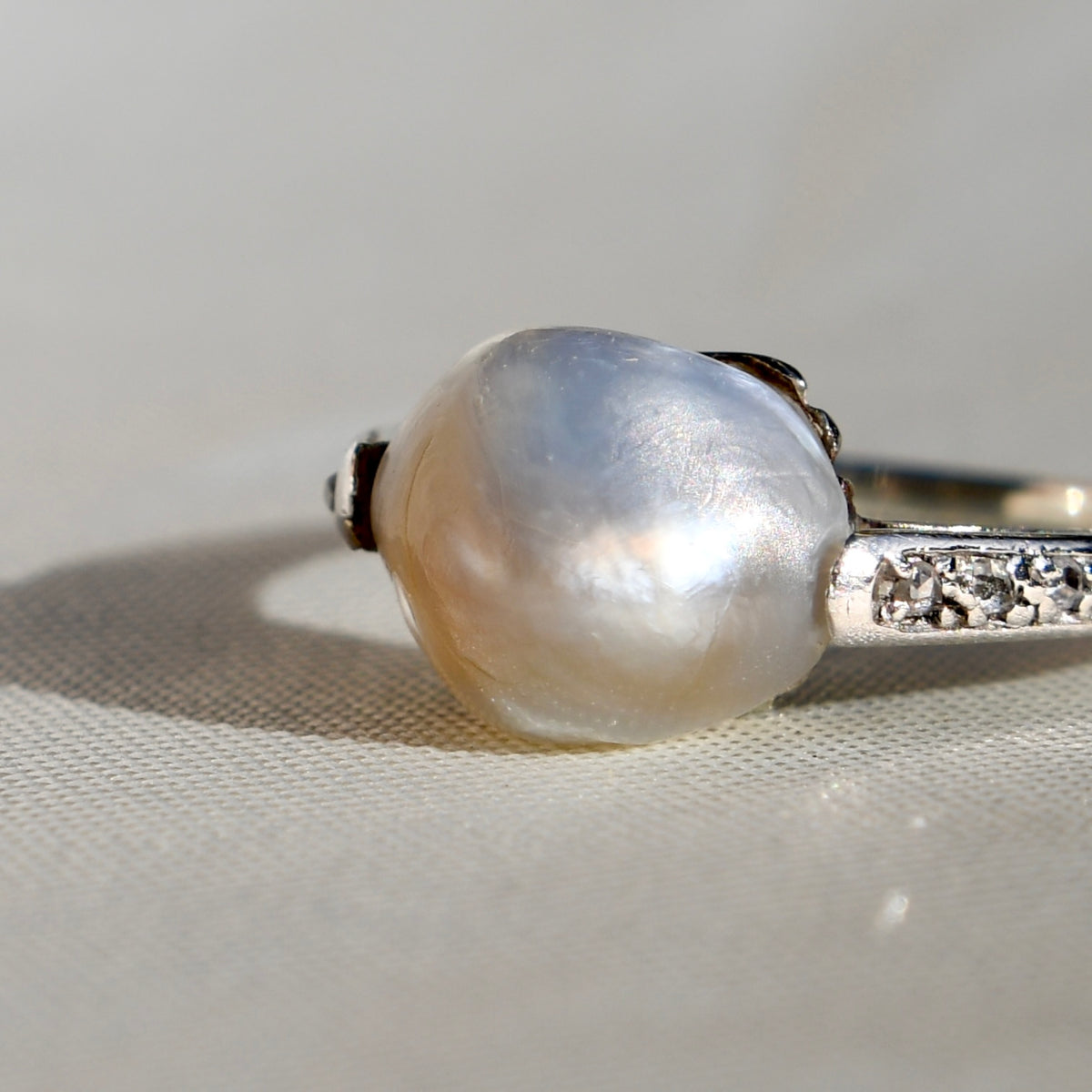 Antique natural saltwater pearl solitaire ring