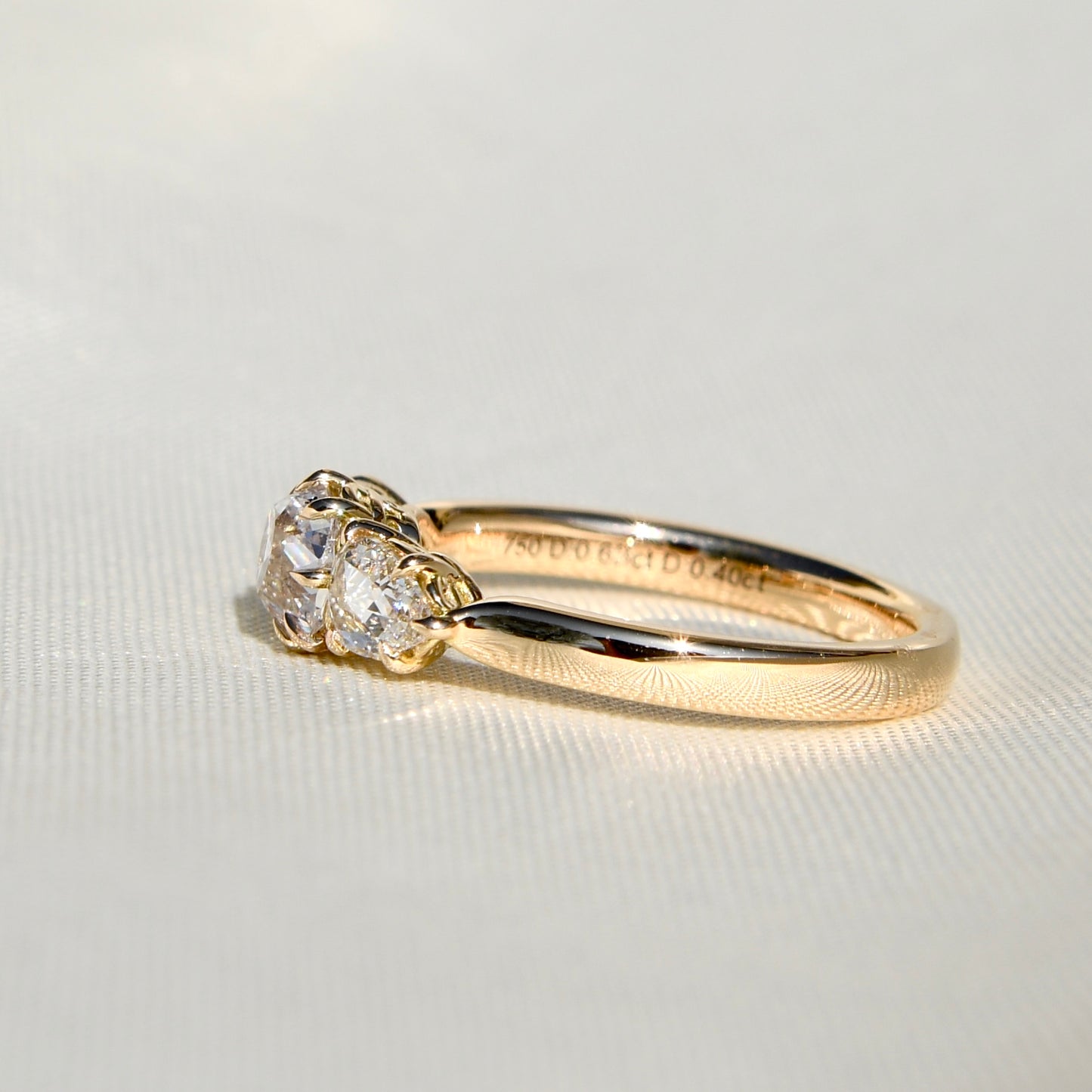 0.63 ct old mine and pear rose cut diamond three stone ring