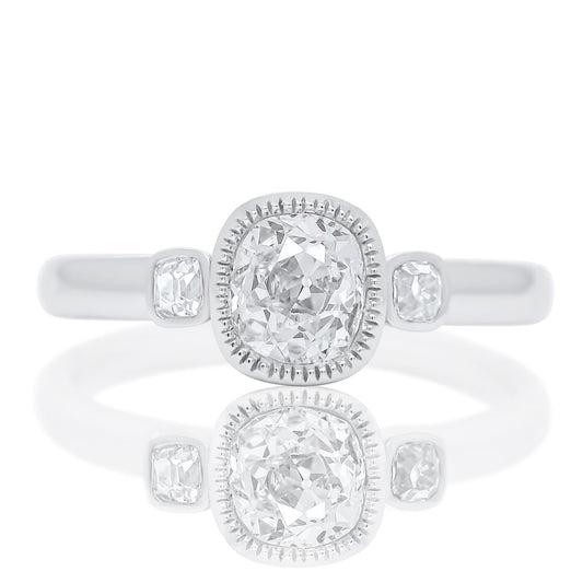 0.60 ct old mine and peruzzi cut diamond three stone ring