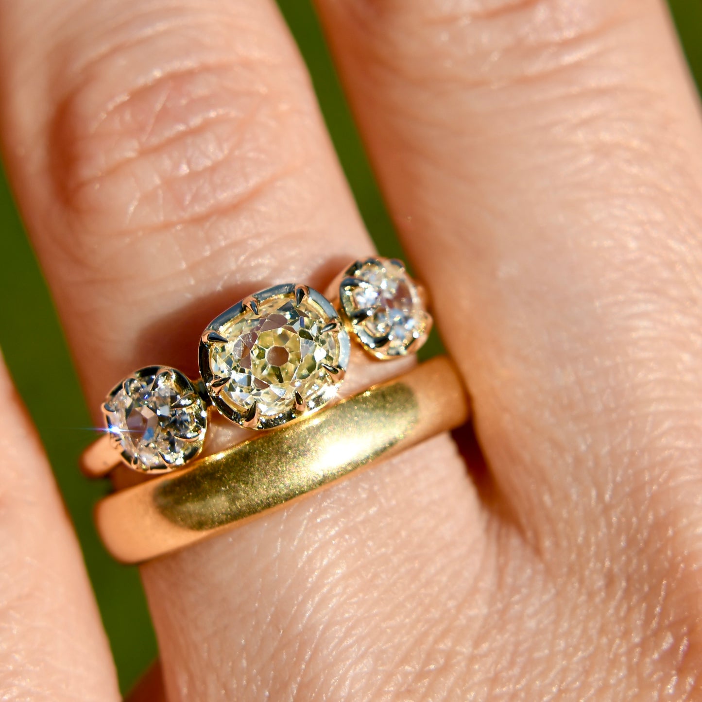 0.86 ct old mine cut diamond three stone ring