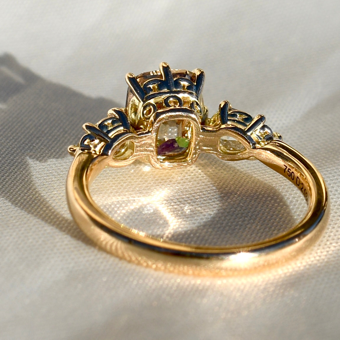 2.03 ct old mine and pear rose cut diamond three stone ring