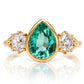 1.34 ct Colombian pear cut emerald and old mine cut diamond three stone ring