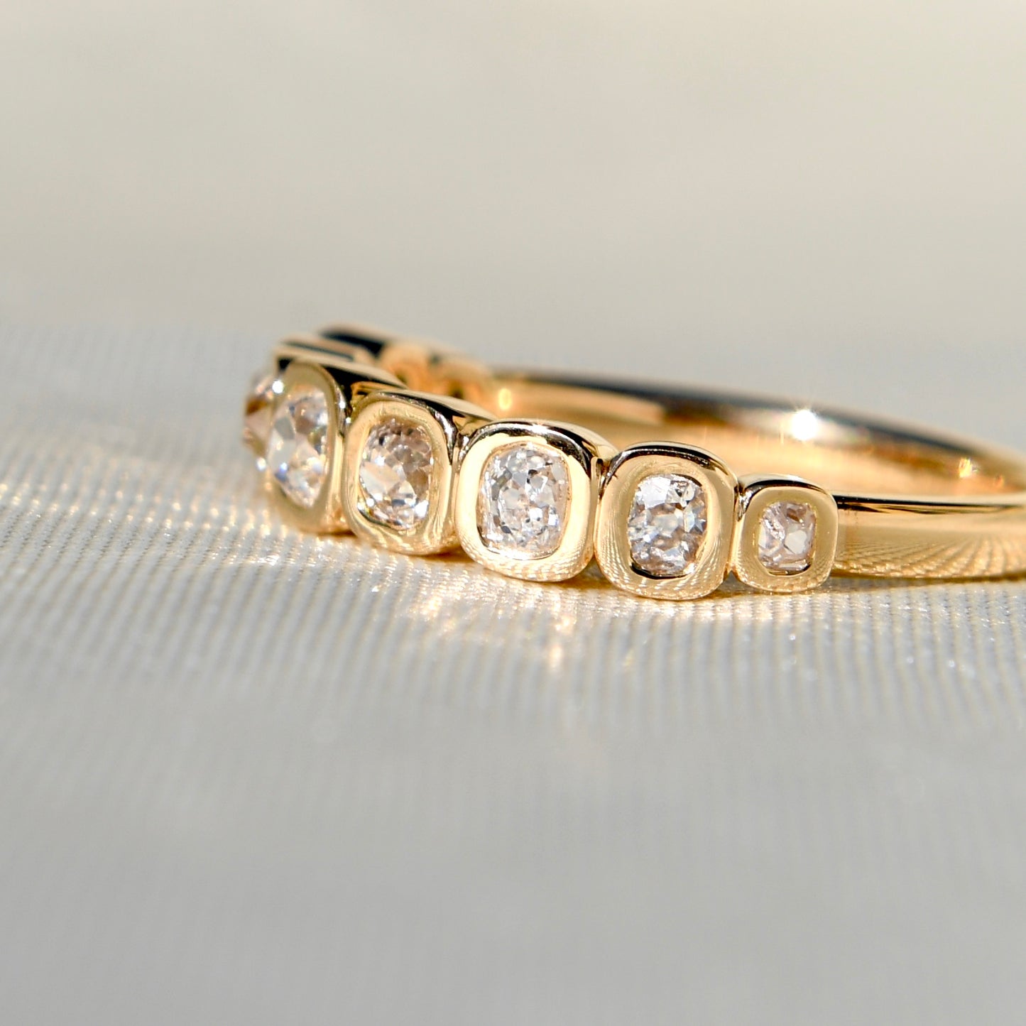 0.52 ct old mine cut diamond nine stone ring