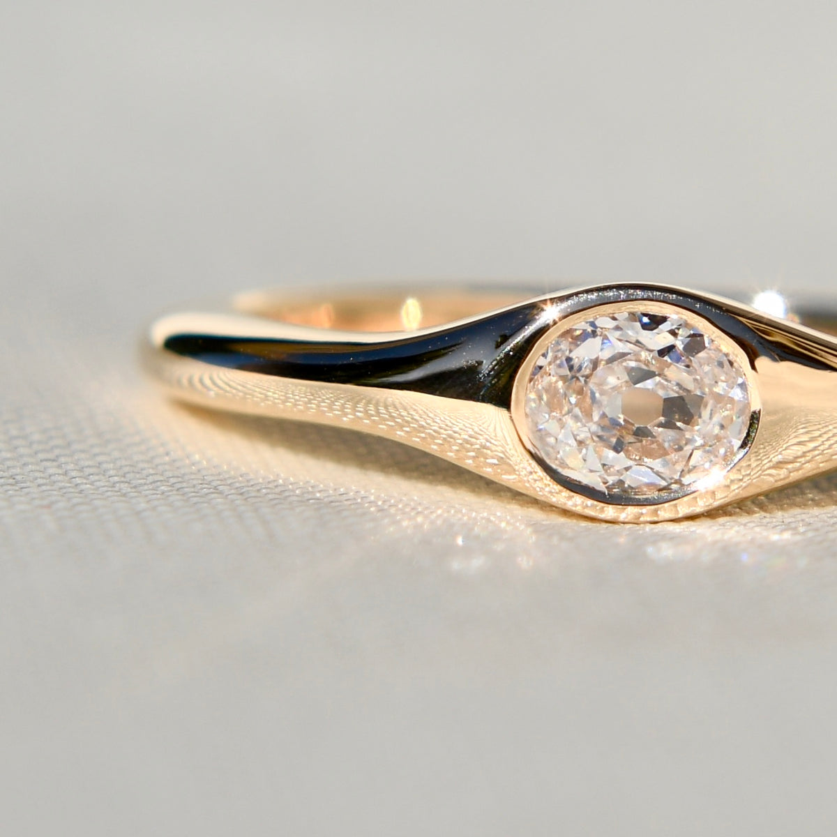 0.22 ct oval old mine cut diamond solitaire band ring