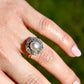 Antique natural pearl and 1.30 ct old mine cut diamond daisy ring