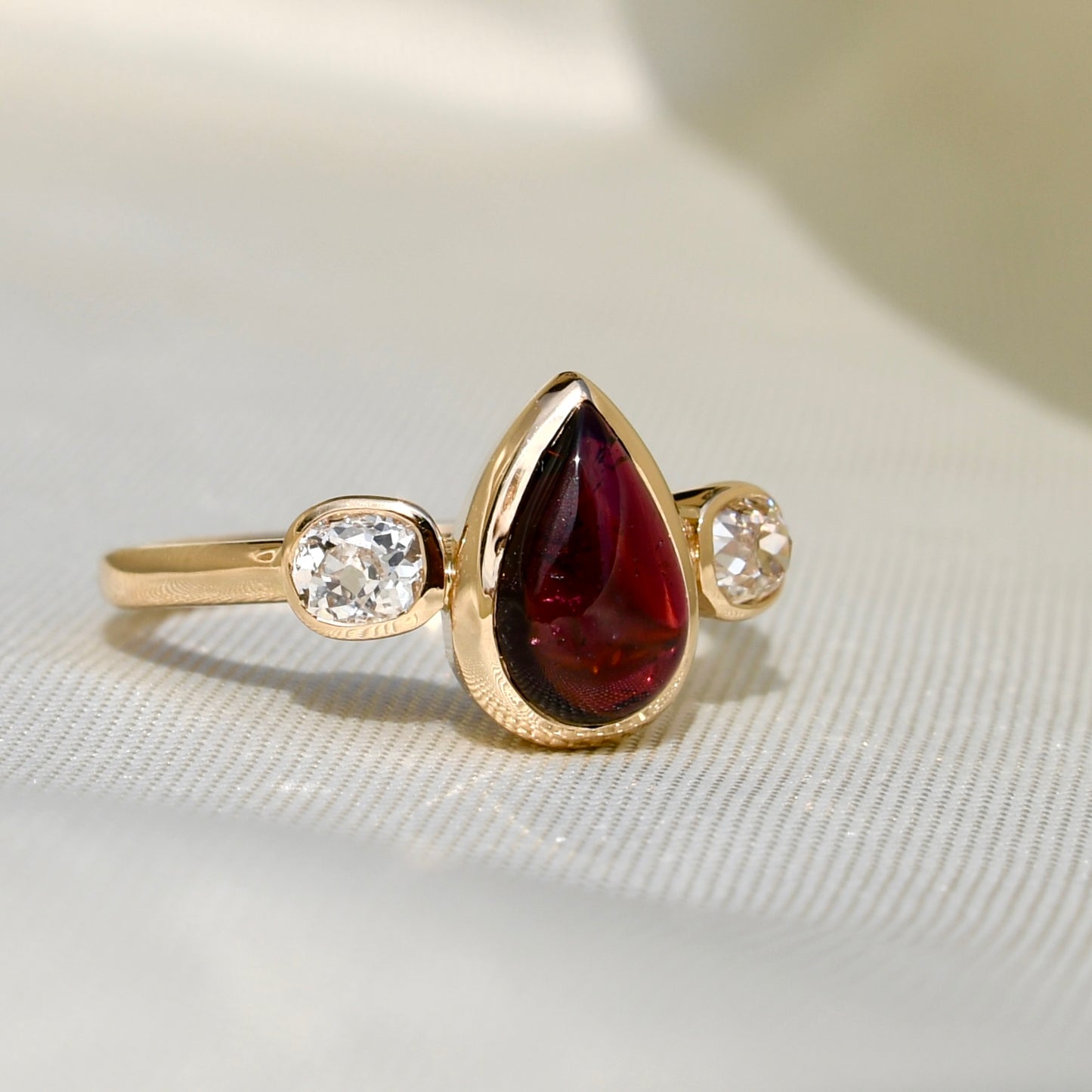 1.26 ct Tourmaline pear and old mine cut diamond three stone ring