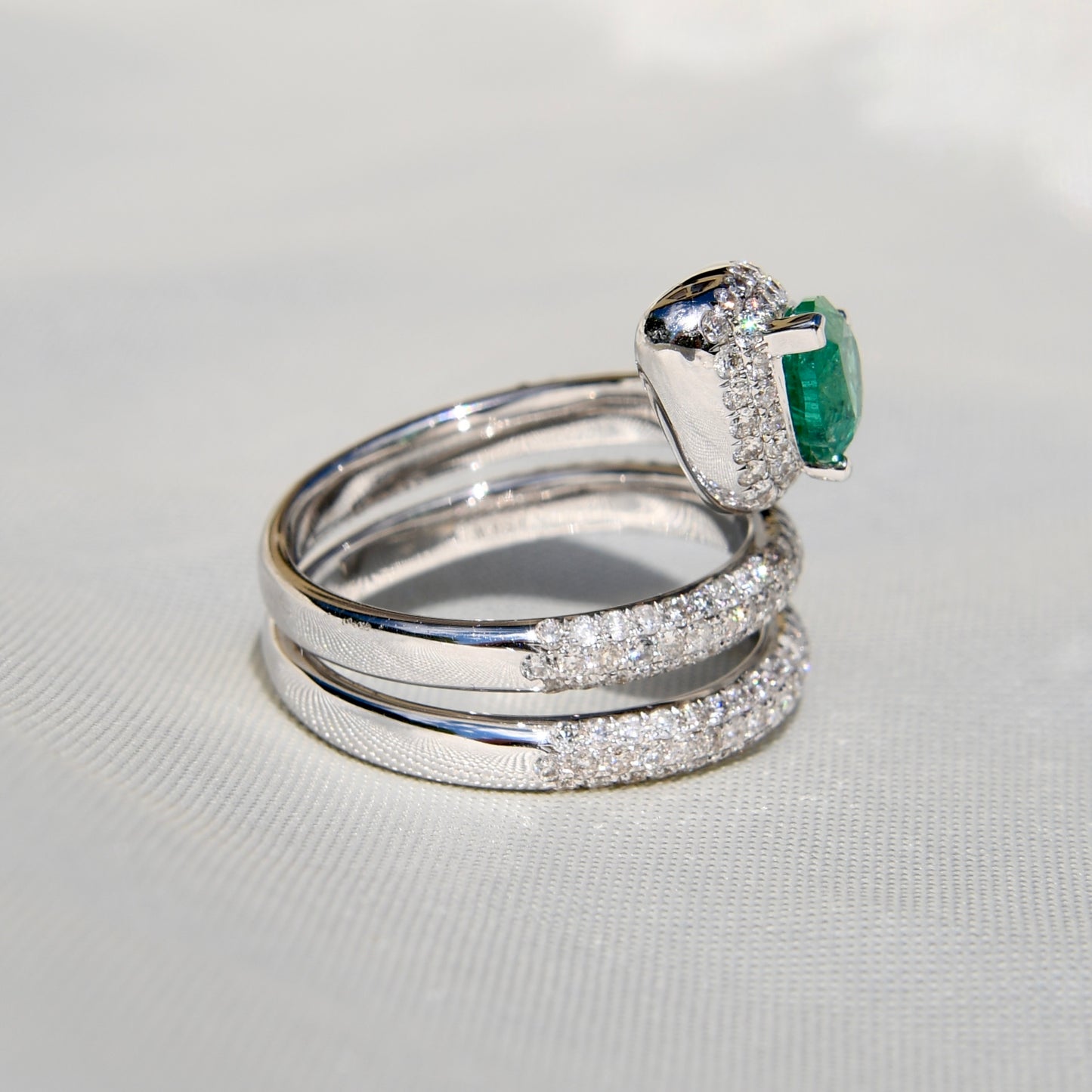1.13 ct pear cut emerald and diamond snake ring