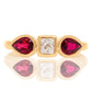 0.30 ct peruzzi cut diamond and pear ruby three stone ring