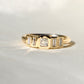 0.23 ct peruzzi and baguette cut diamond five stone ring