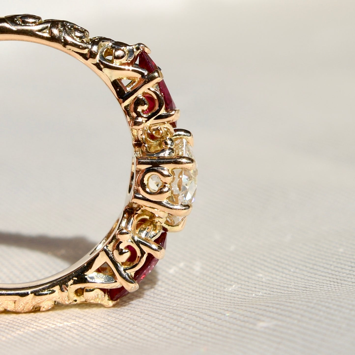0.84 ct old European cut diamond and ruby three stone ring