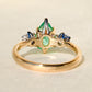 1.66 ct Colombian emerald and old mine cut diamond three stone ring
