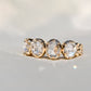 1.30 ct rose cut diamond four stone band ring