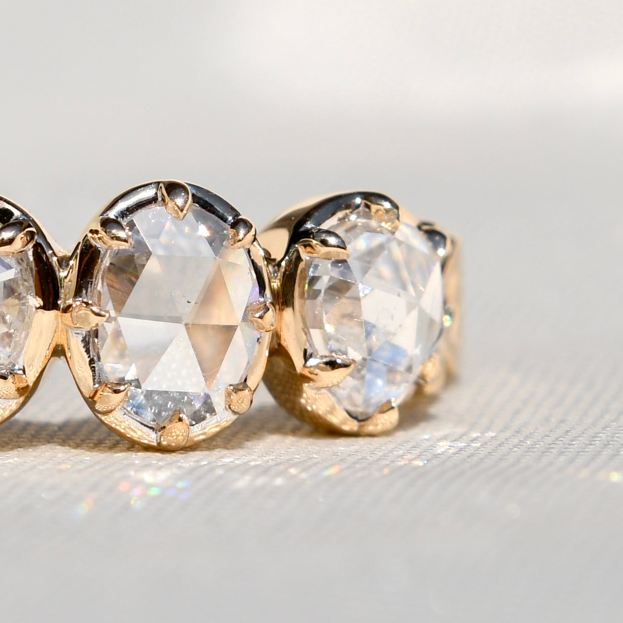 1.30 ct rose cut diamond four stone band ring