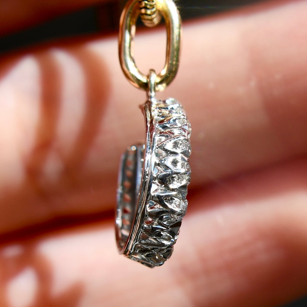 Antique 0.60 ct old European cut diamond horseshoe pendant