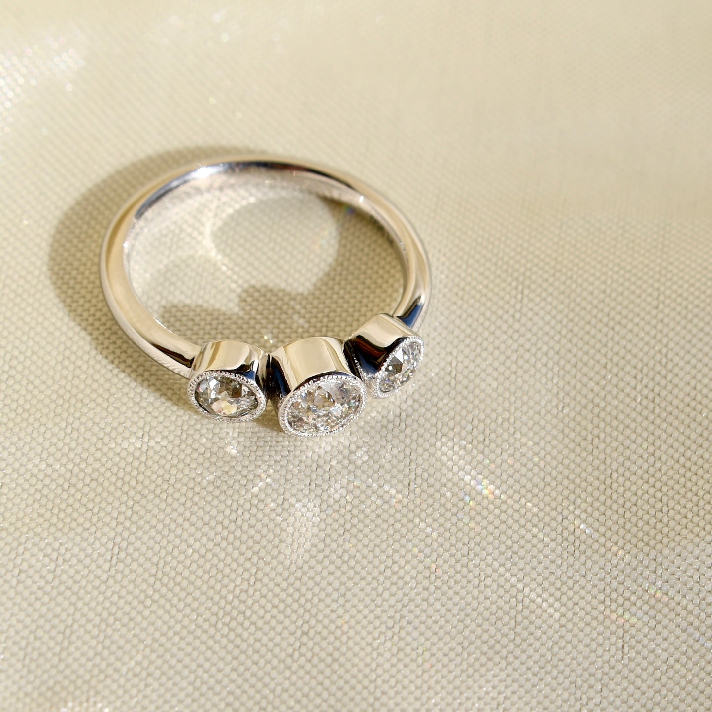 0.86ct old European cut diamond three stone ring