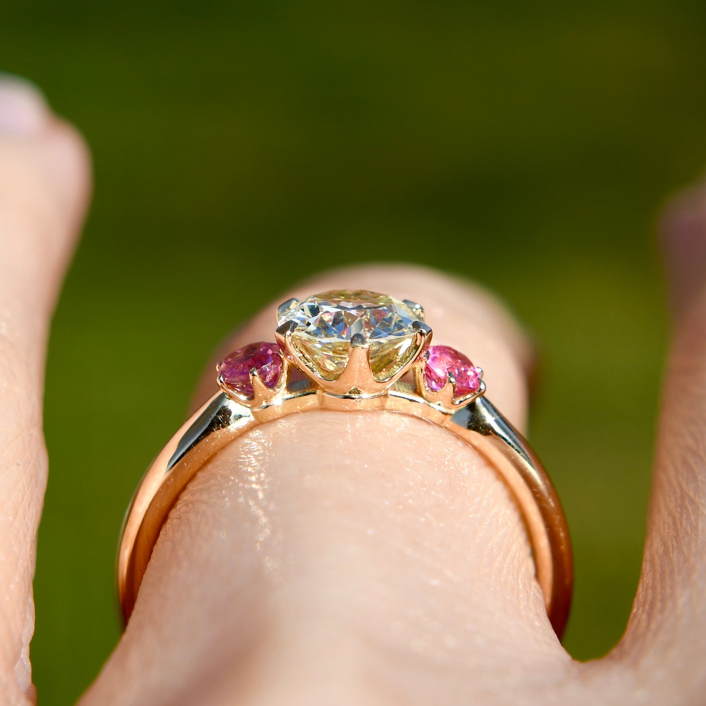 0.78 ct transitional cut diamond and spinel three stone ring