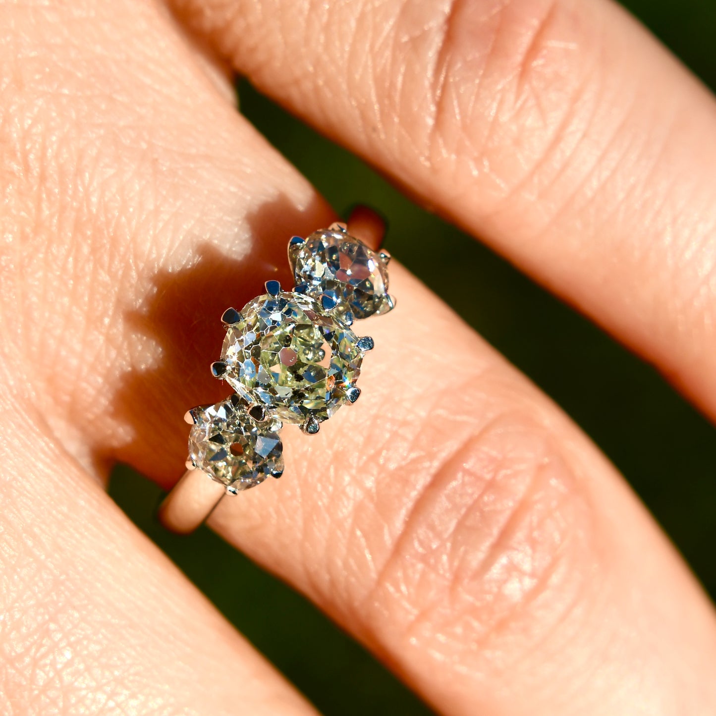 1.25 ct old mine cut diamond three stone ring