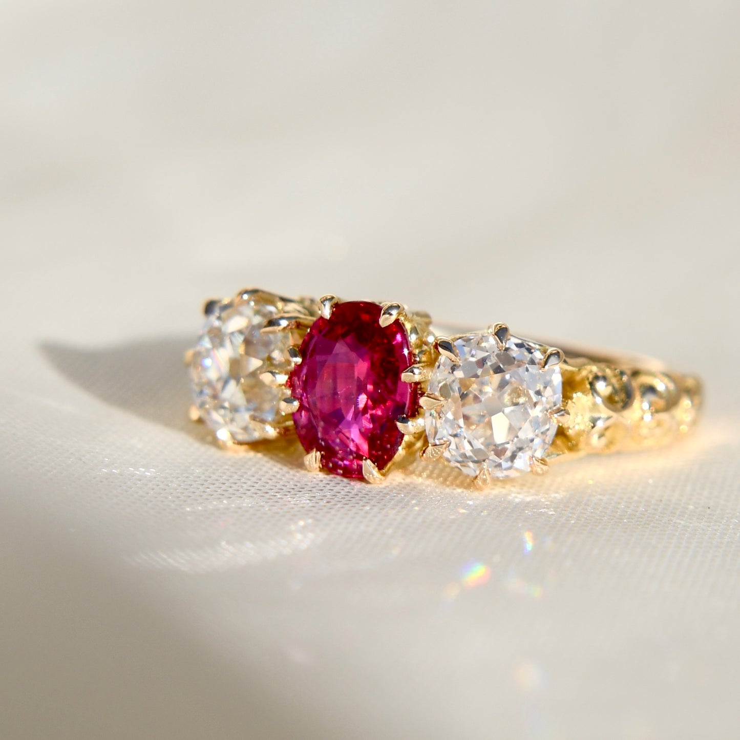 0.94 ct ruby and old mine cut diamond three stone ring