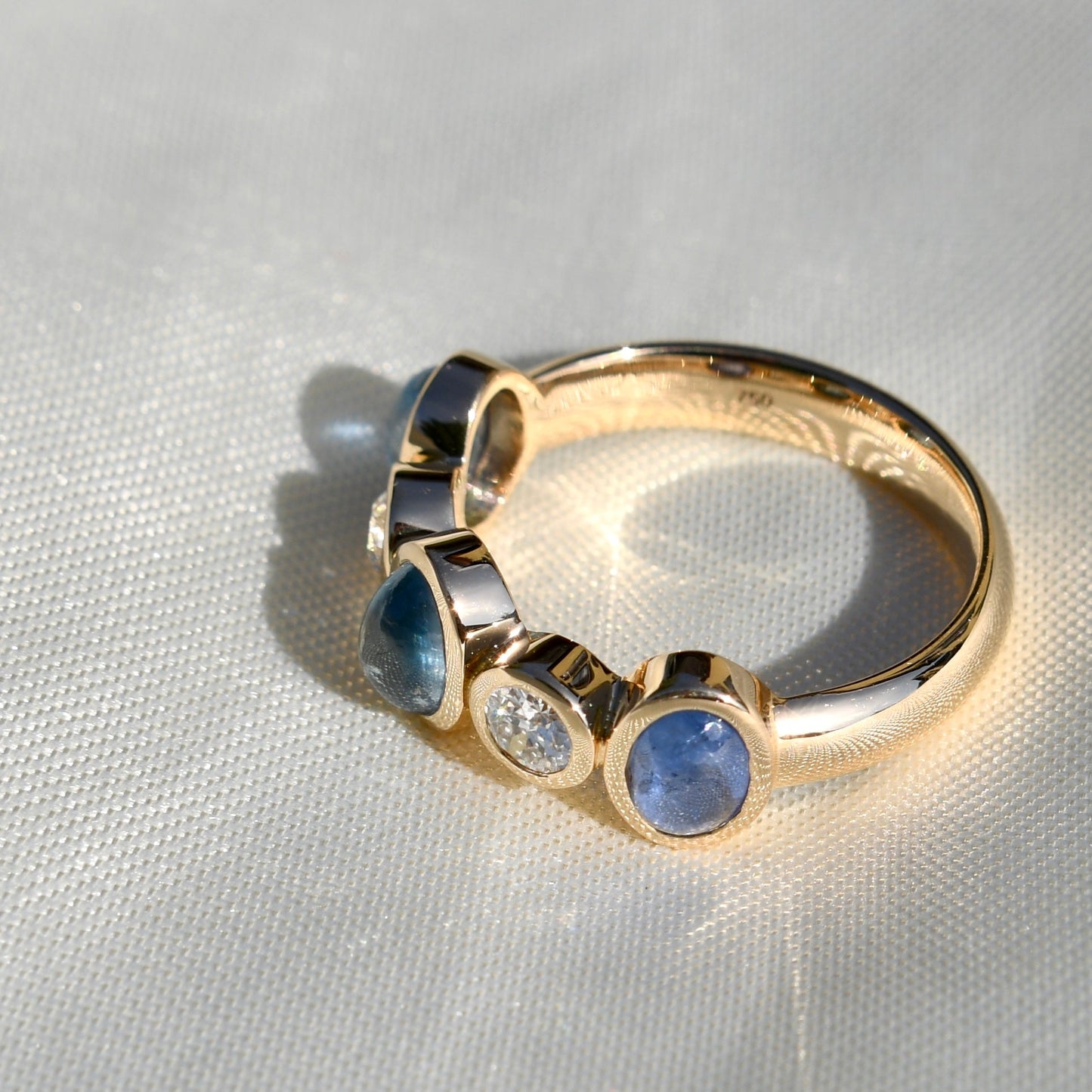 Installment 4/5 for C.- 0.33ct old European cut diamond and sapphire cabochon five stone ring