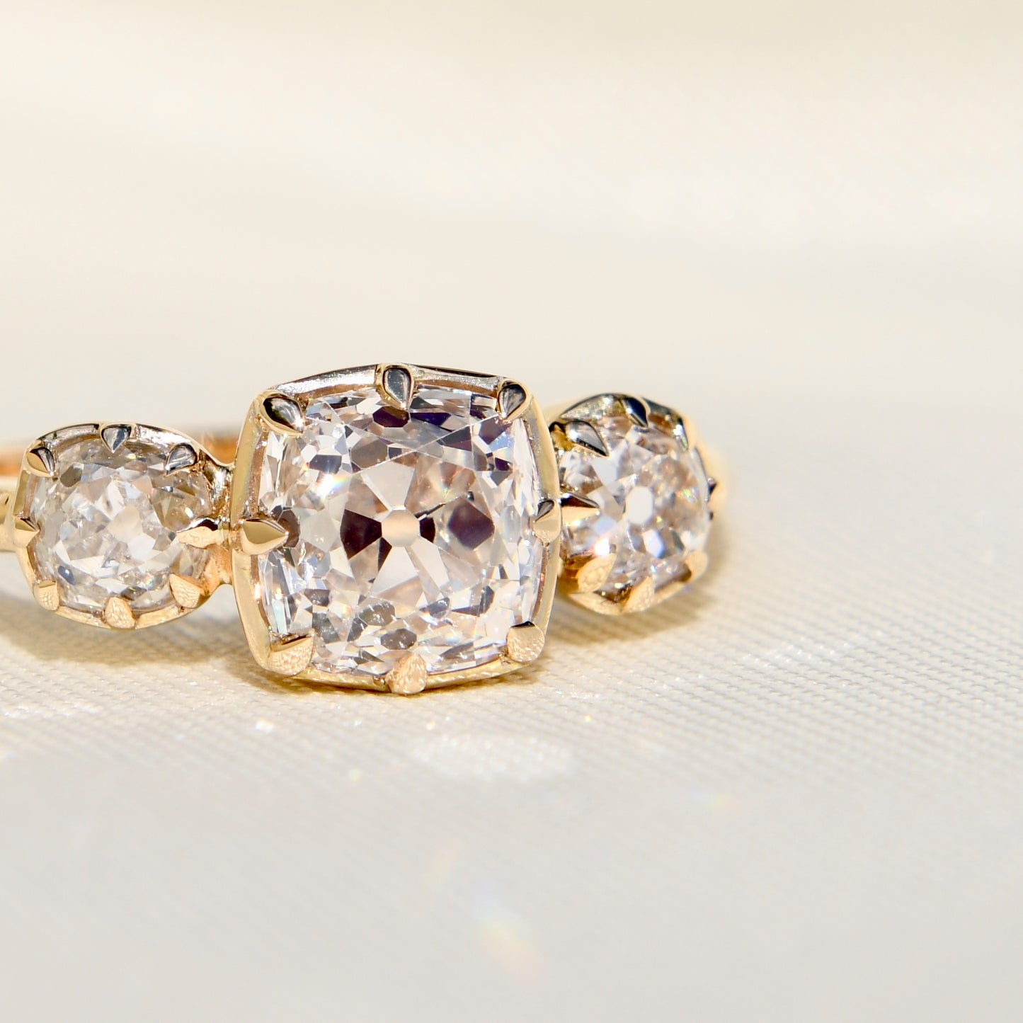 Installment 9/14 - 1.56 ct old mine cut diamond three stone ring