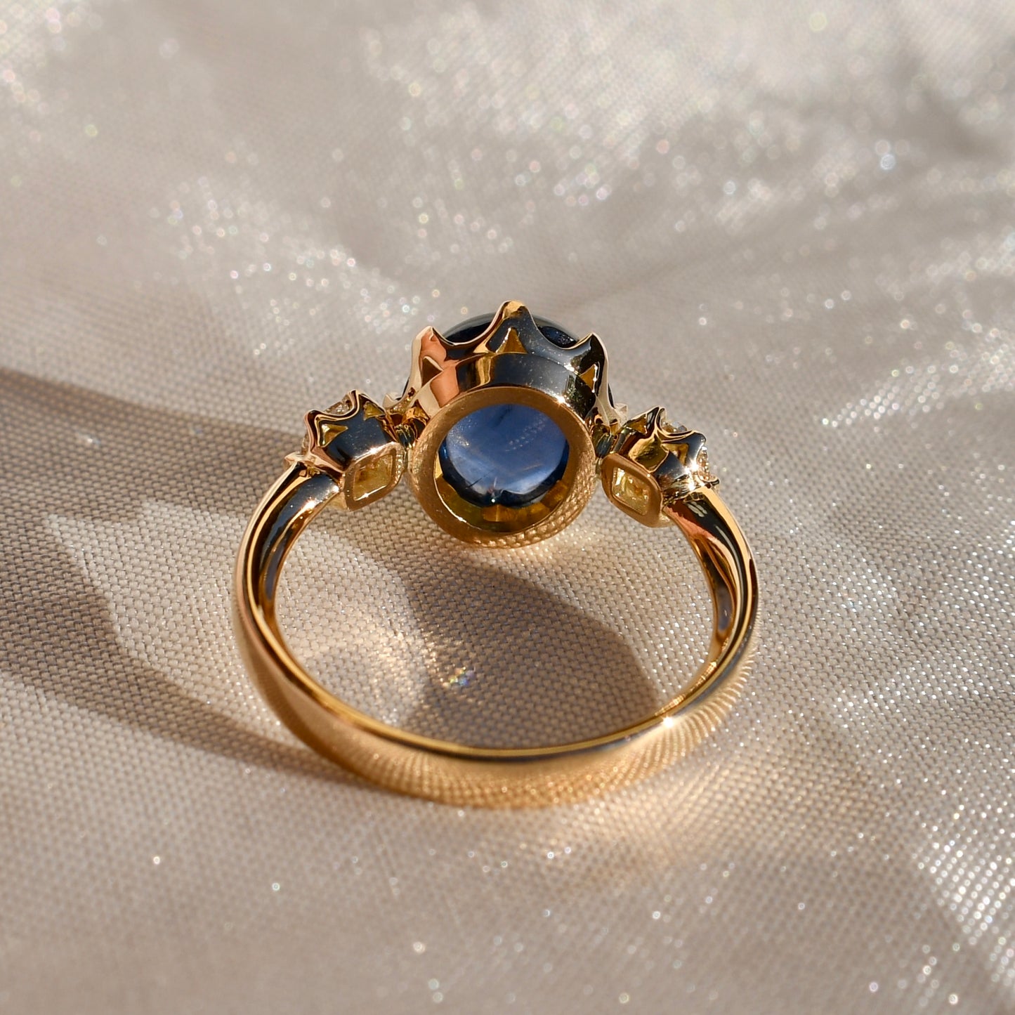 Installment 4/8 - 4.27 ct sapphire cabochon and old mine cut diamond three stone ring