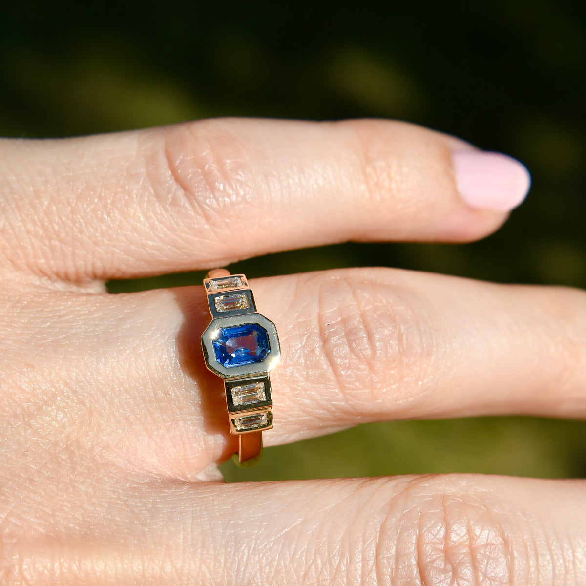 0.61 ct Ceylon sapphire and baguette cut diamond five stone ring