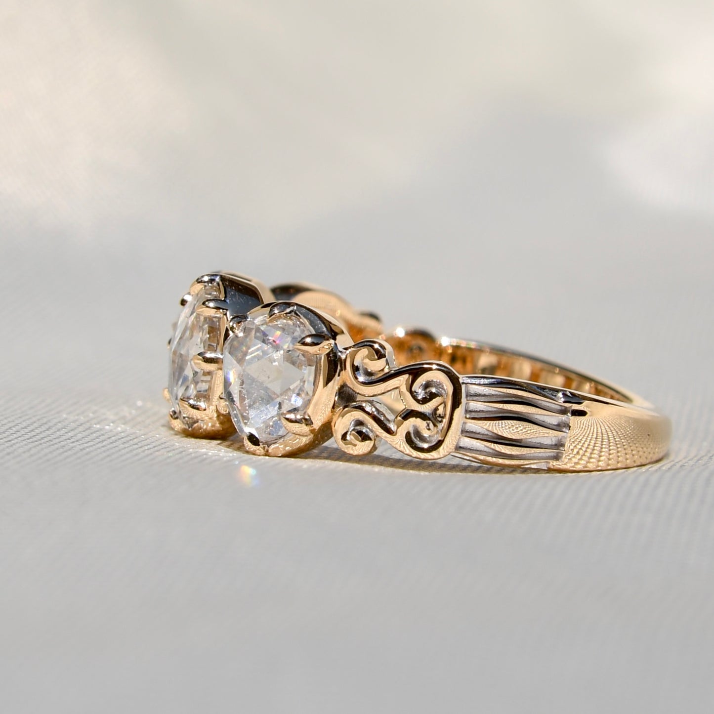 1.30 ct rose cut diamond four stone band ring