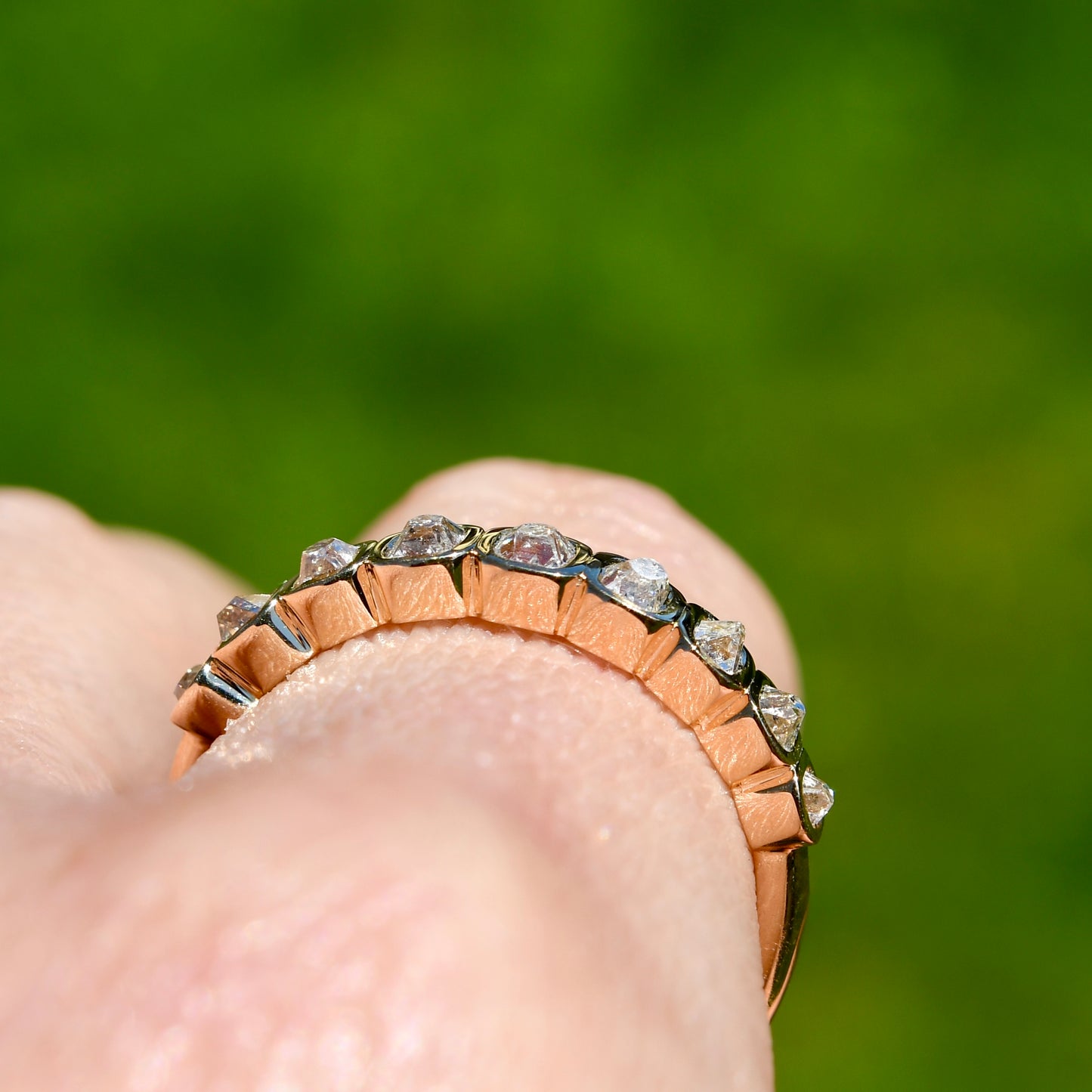 0.67 ct peruzzi cut diamond nine stone band ring