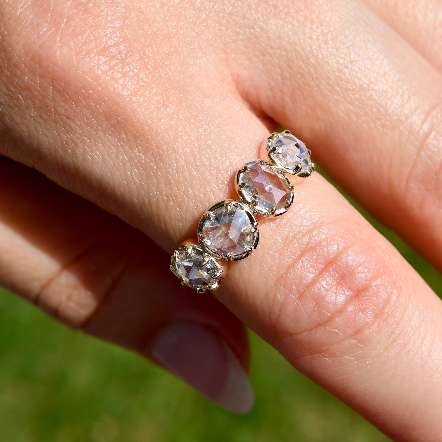 1.30 ct rose cut diamond four stone band ring