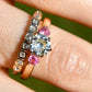 0.78 ct transitional cut diamond and spinel three stone ring