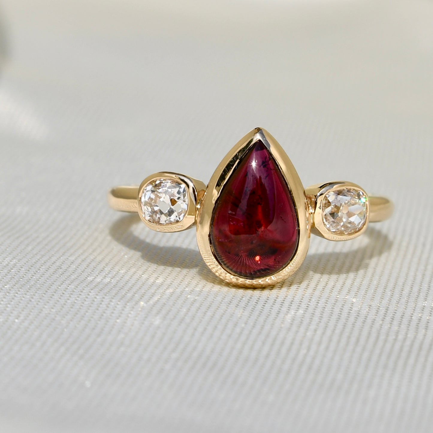 1.26 ct Tourmaline pear and old mine cut diamond three stone ring