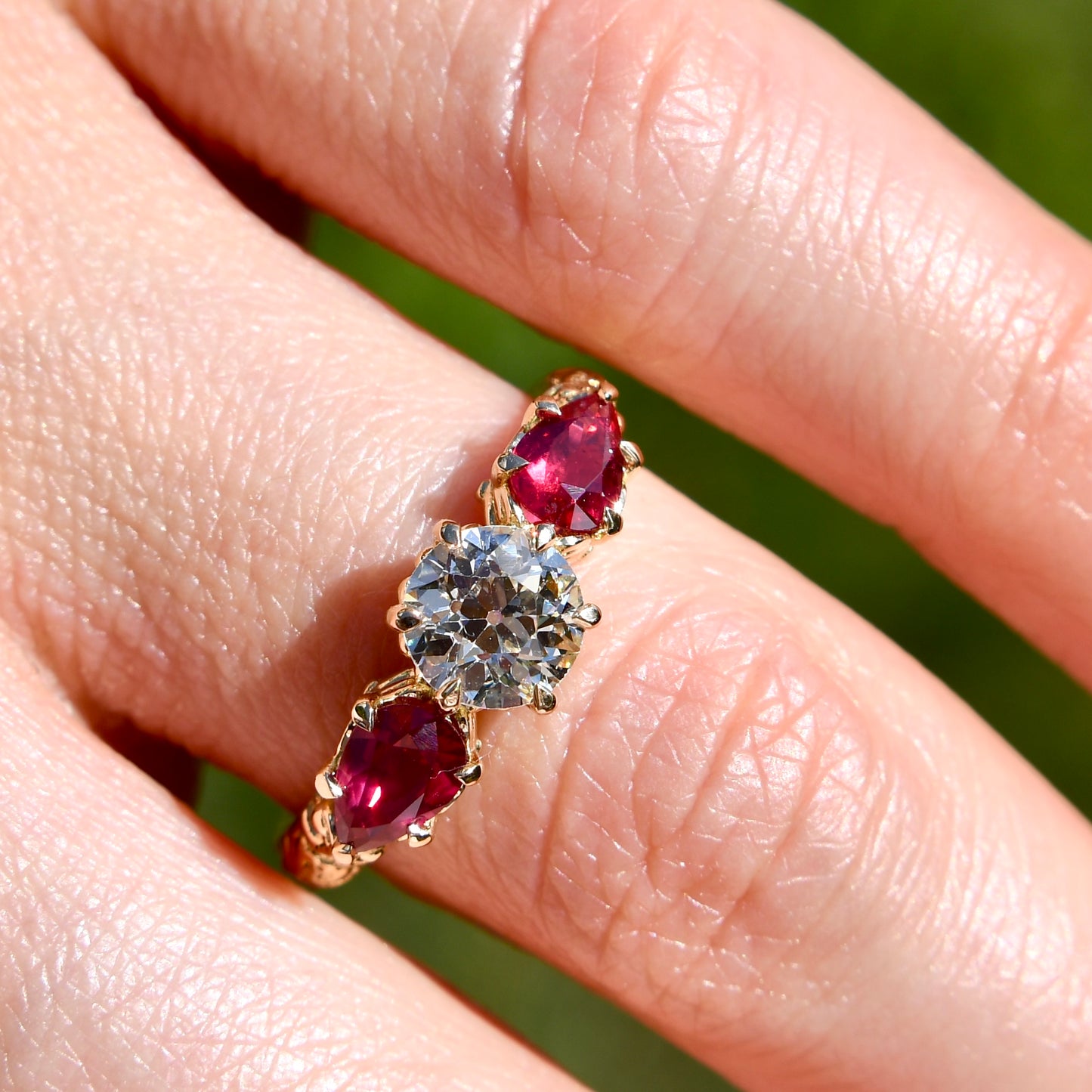 0.84 ct old European cut diamond and ruby three stone ring