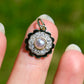 Antique natural pearl and 0.24 ct old mine cut diamond daisy pendant