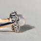 Antique natural pearl and 1.30 ct old mine cut diamond daisy ring