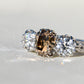 2.97 ct old mine and old European cut diamond tulip three stone ring