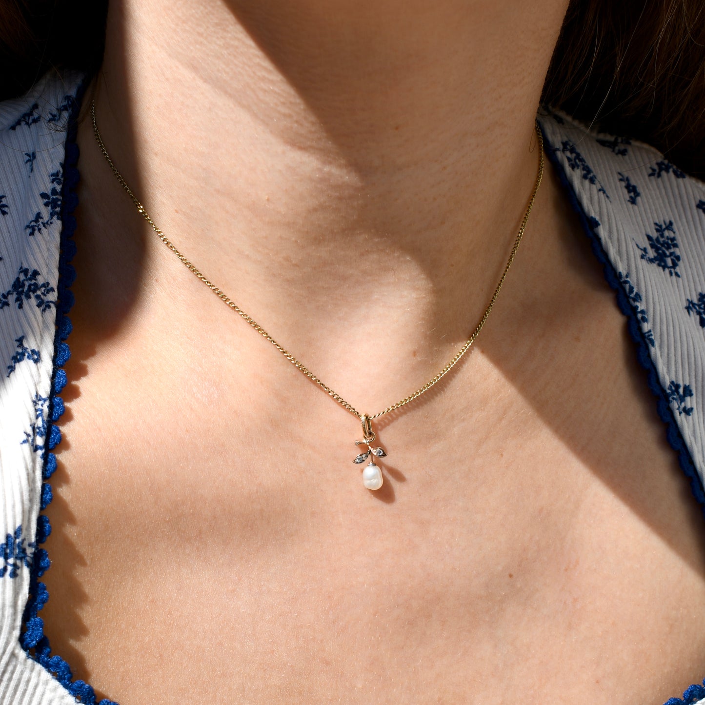 Natural saltwater baroque pearl and rose cut diamond pendant