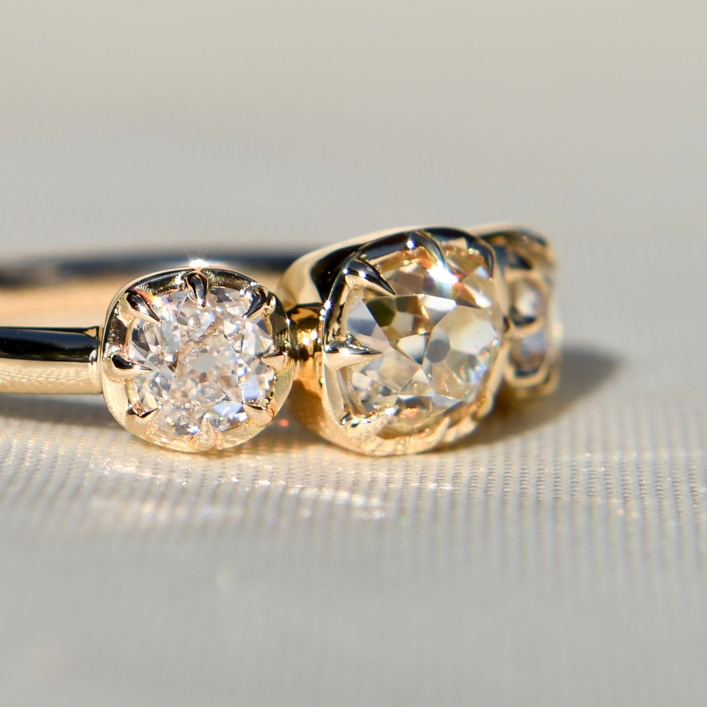 0.86 ct old mine cut diamond three stone ring