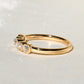 0.52 ct peruzzi cut diamond five stone band ring
