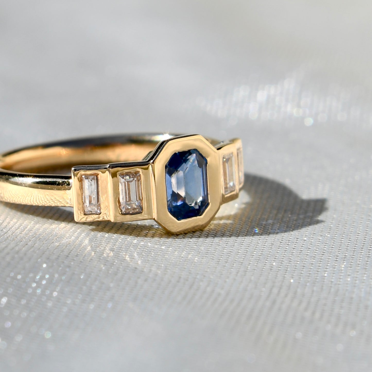 0.61 ct Ceylon sapphire and baguette cut diamond five stone ring