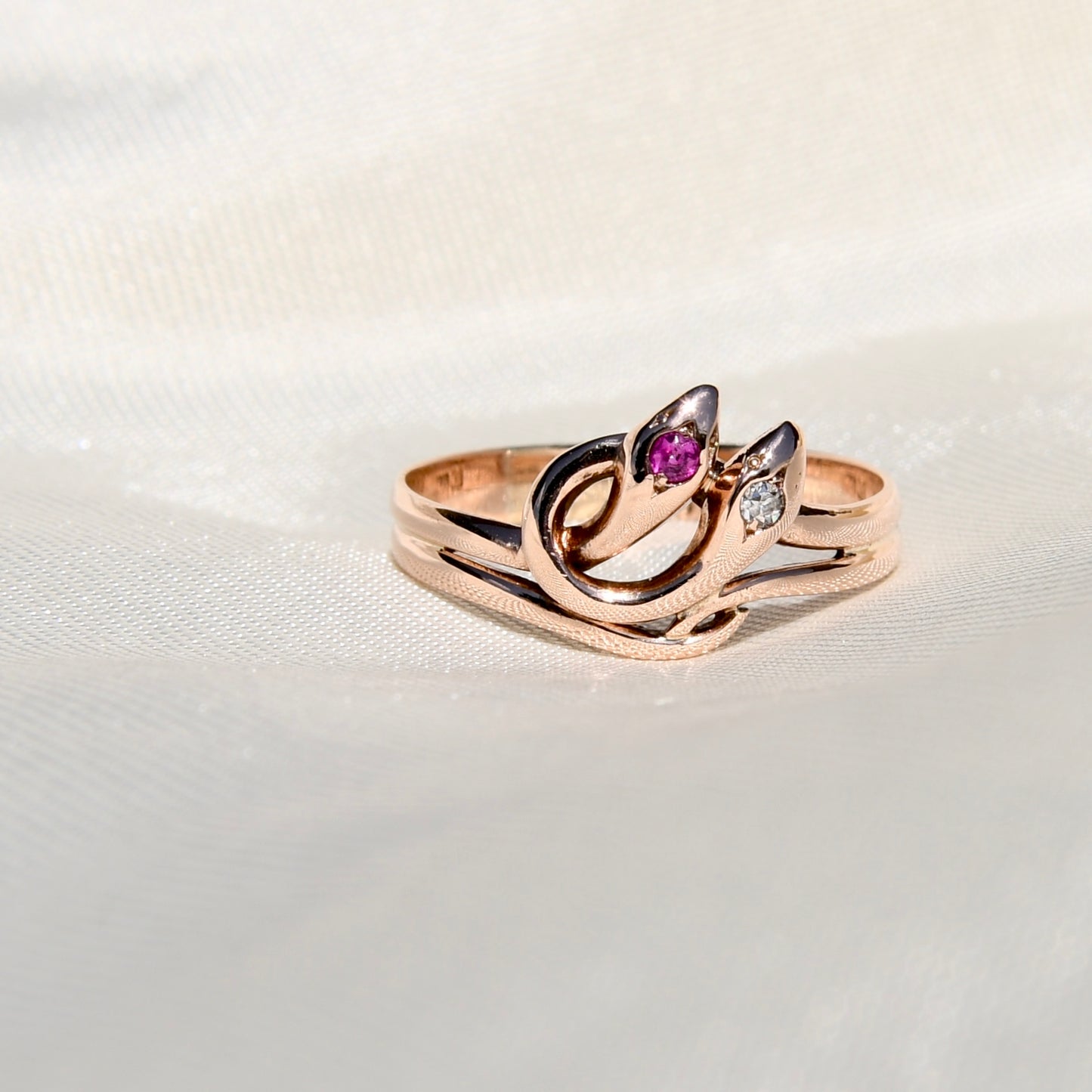Antique ruby and old cut diamond double snake ring