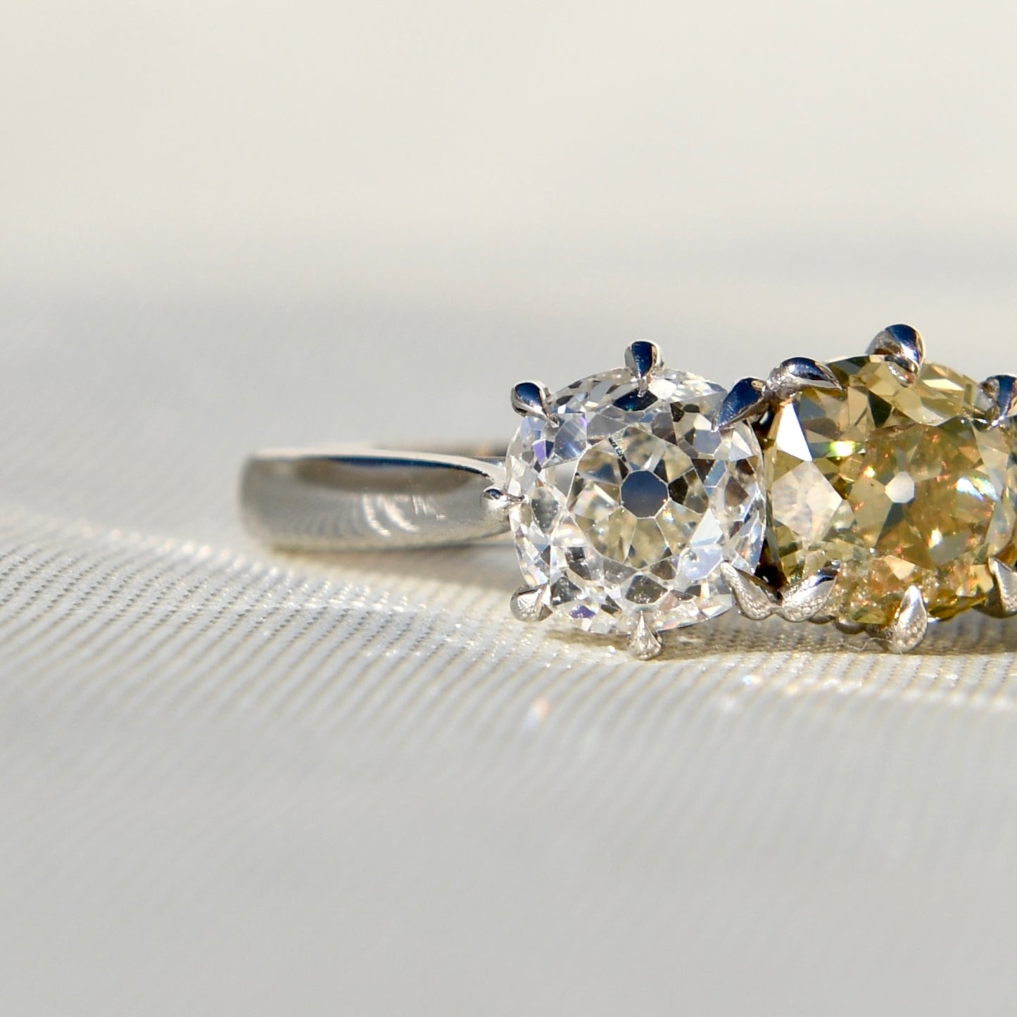 2.66 ct old mine cut diamond three stone ring