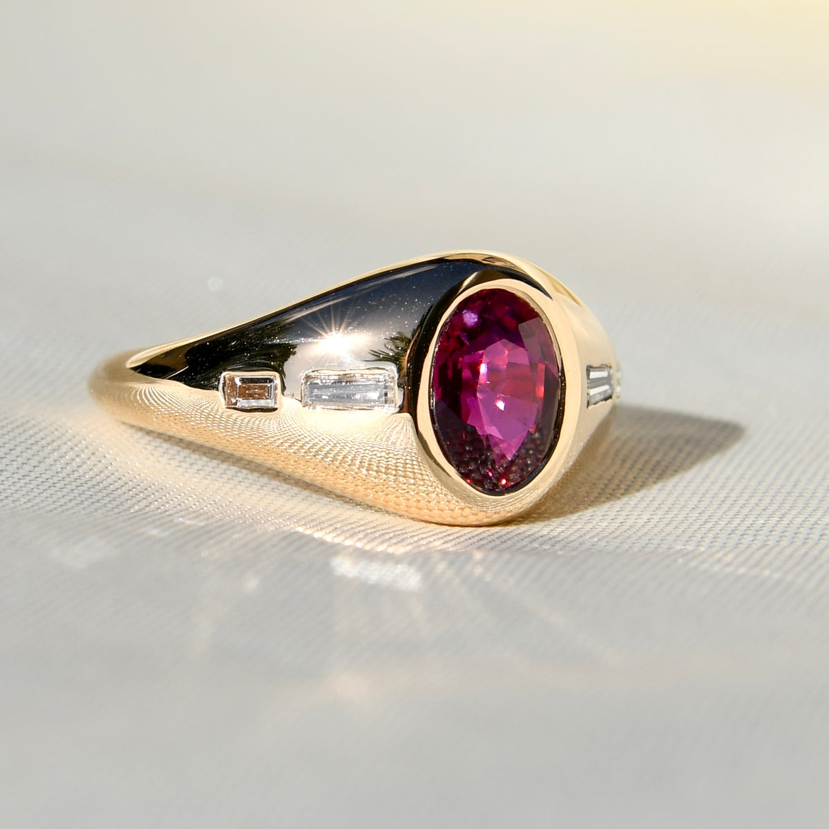 1.20 ct oval ruby and baguette cut diamond band ring