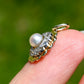 Antique natural pearl and 0.24 ct old mine cut diamond daisy pendant