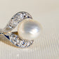 Natural saltwater pearl and diamond tulip pendant
