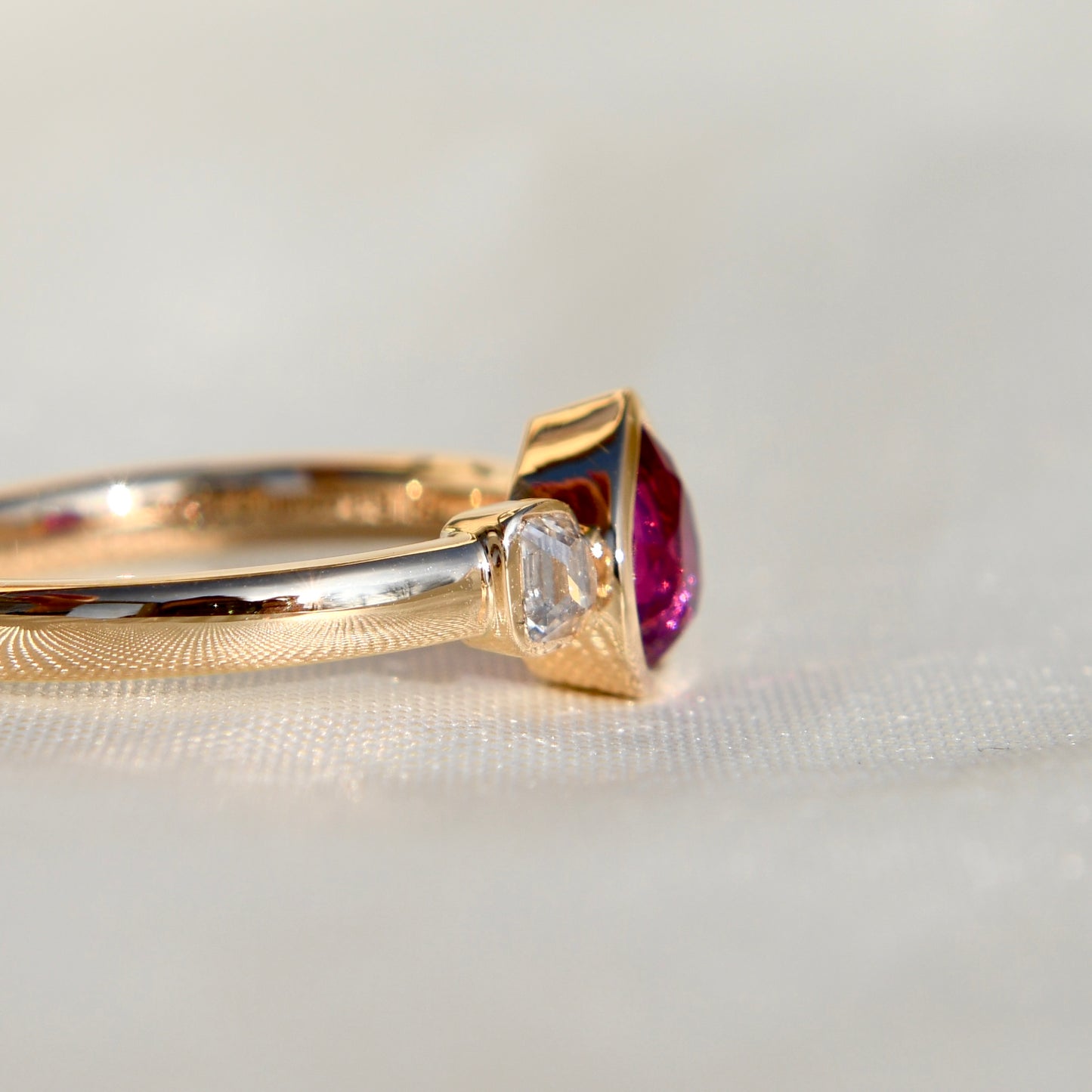 1.01 ct ruby and peruzzi cut diamond three stone ring